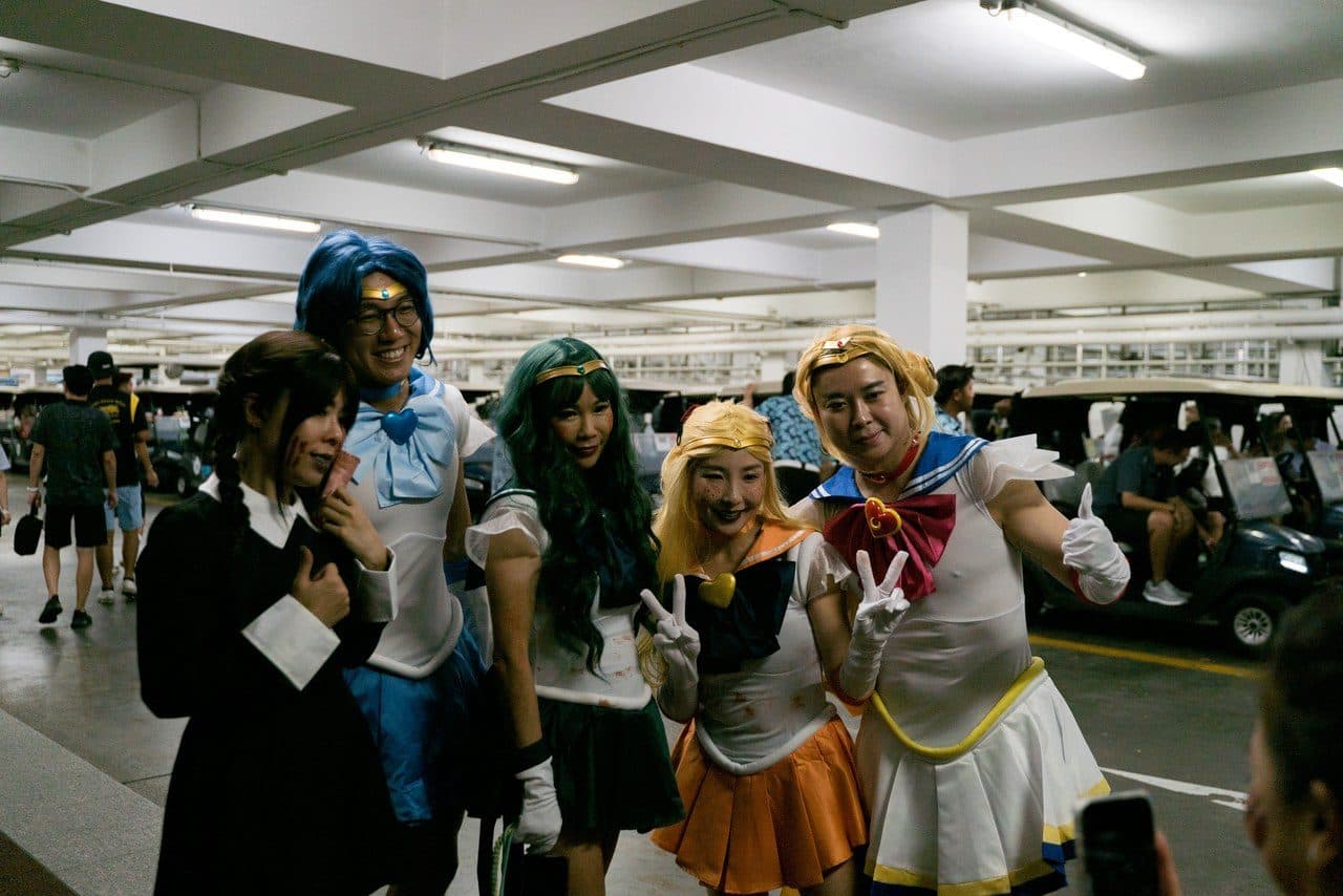 Members in costume at a themed tournament
